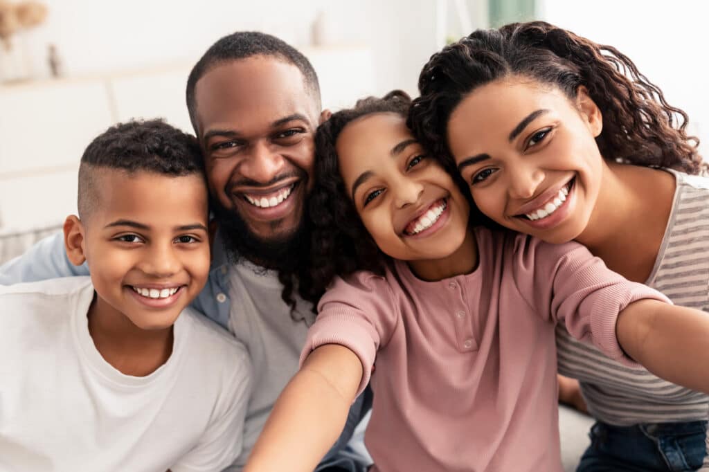 Young happy family with estate plan